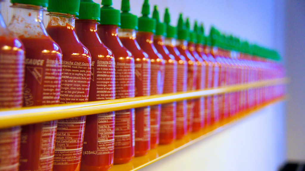 Sriracha Sauce lined up at ShopHouse Restaurant 2